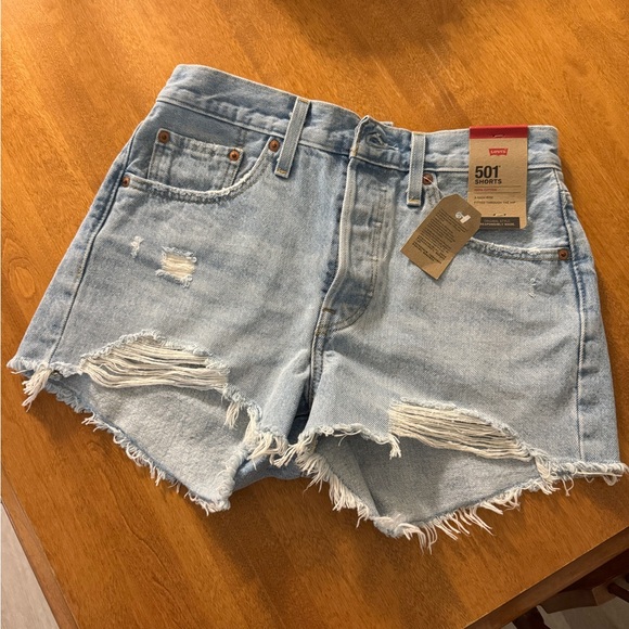 Levi's Women's Distressed Light Blue Jean Shorts - Picture 1 of 3